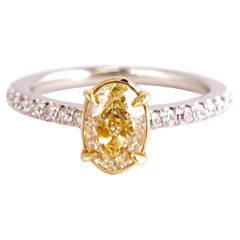 Certified 1.04 Ct Fancy Yellow Oval Cut Engagement Ring in Platinum