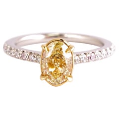 Bague de fiançailles jaune fantaisie taille ovale certifiée 1,04 carat