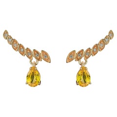 14 Karat Gold Ohrringe mit birnenförmigen Saphiren und Diamanten