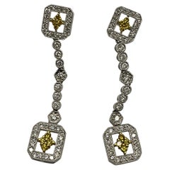 White and Yellow Diamond in White Gold and Yellow Gold Dangling Earrings