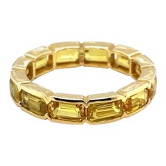 18 Karat Yellow Gold and Yellow Sapphire Memory Ring