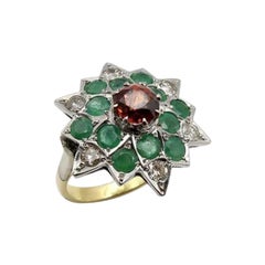 18 Karat Gold Vintage Starburst-Ring mit Spessartit-Granat, Smaragden und Diamanten