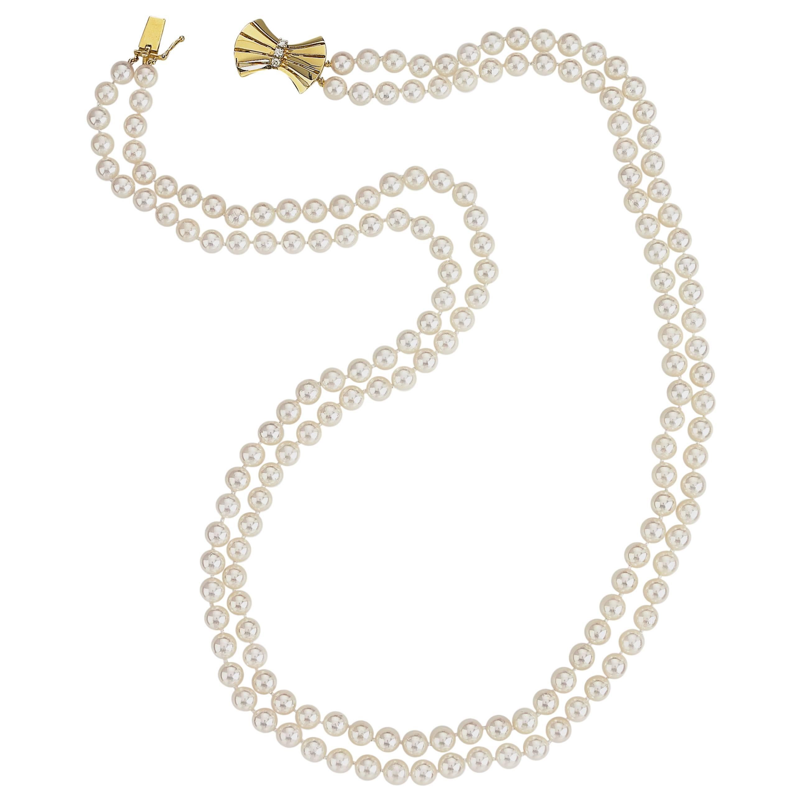 Classic, Double-Strand, Cultured Pearl Necklace with Diamond and Gold Bow Clasp