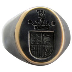 Bague de signalisation ancienne en acier et or
