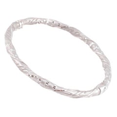 Bangle inciso in oro bianco 18 carati