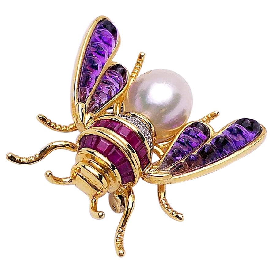 Broche abeille en or jaune 18 carats avec rubis, diamant, améthyste et perle des mers du Sud