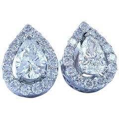 3.15 Carats in Pear Shape Diamond Studs Earrings with Diamond Halos 