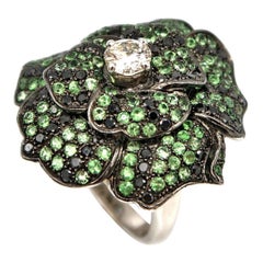 Blooming Green Tsavorite Black White Diamond Pavé Flower 18K Gold Cocktail Ring