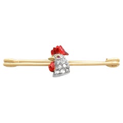 Broche victorienne ancienne en or jaune, diamants et rubis