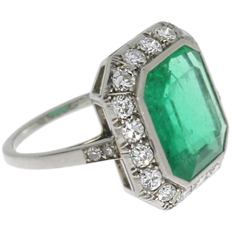 Art Deco Central 4.76 Carat Emerald Diamond Platinum Ring For Sale