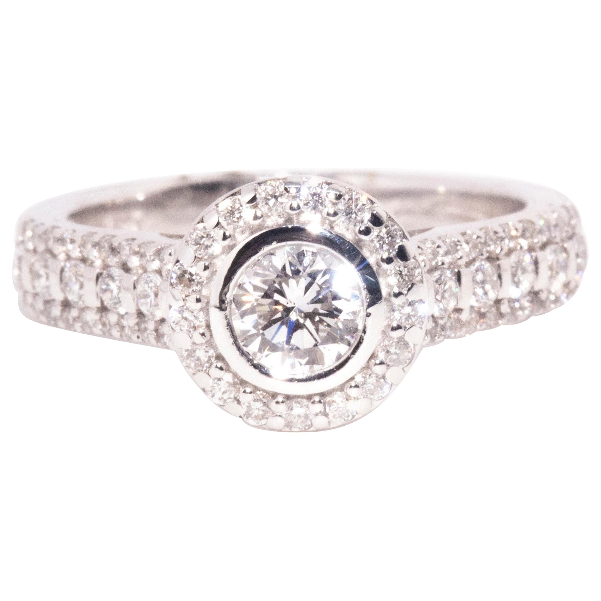 Vintage 0.42 Carat Rub Over Set Diamond 18 Carat White Gold Halo Cluster Ring For Sale