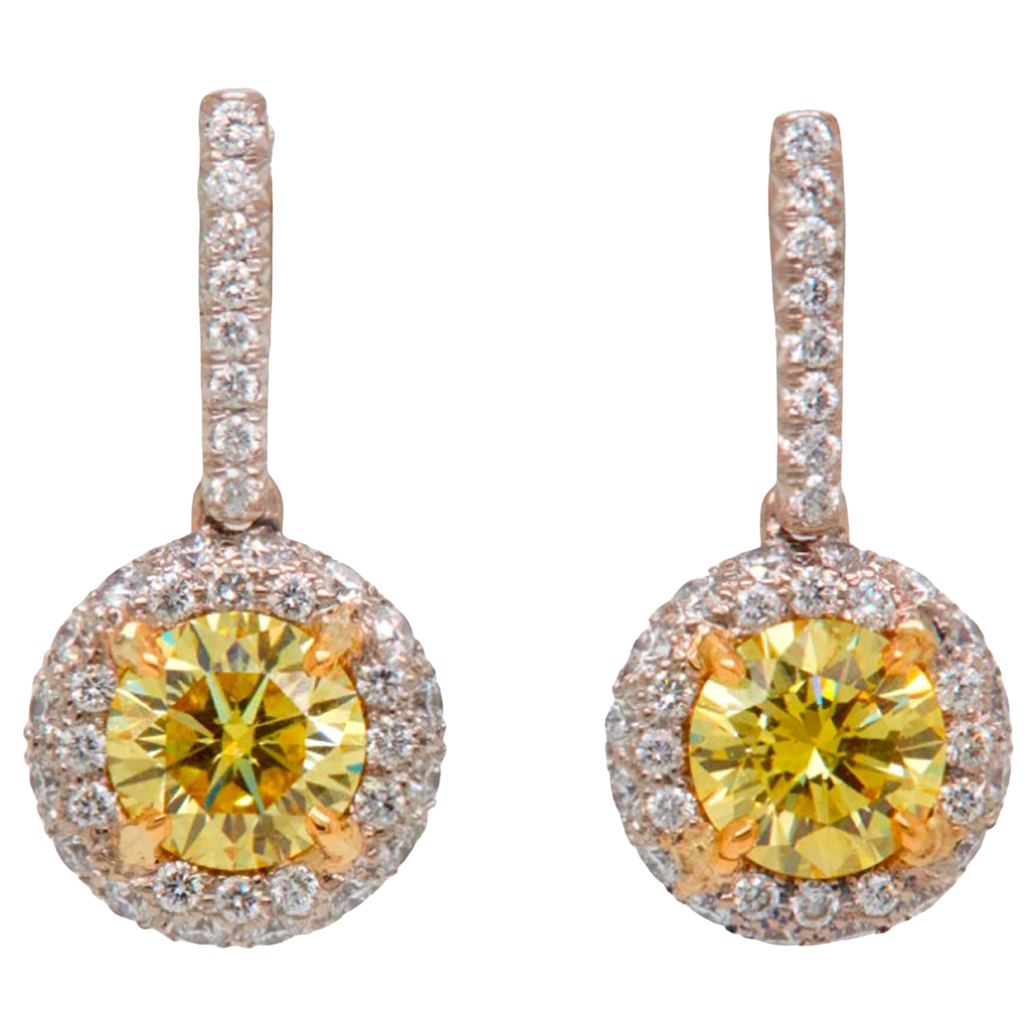2.09 Carat Fancy Vivid Yellow Diamond Drop Earrings with Halo, GIA Report For Sale