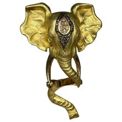Elephant Cocktail Ring in 18k yellow gold set with white and brown diamonds 