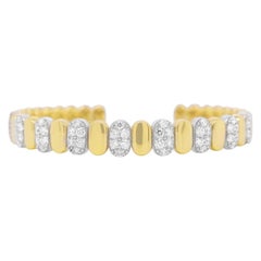 Alternating Diamond and 14K Two Tone Yellow and White Gold Oval Shaped Bangle