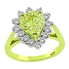 Anillo de compromiso con diamante amarillo fantasía natural de 1,68 ct certificado por el GIA