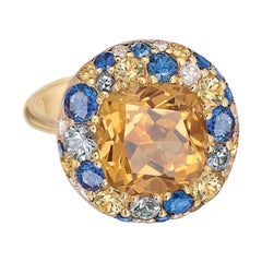 Anillo de diamantes de diseño de tres piedras en oro de 18 quilates con citrino amarillo y zafiro azul