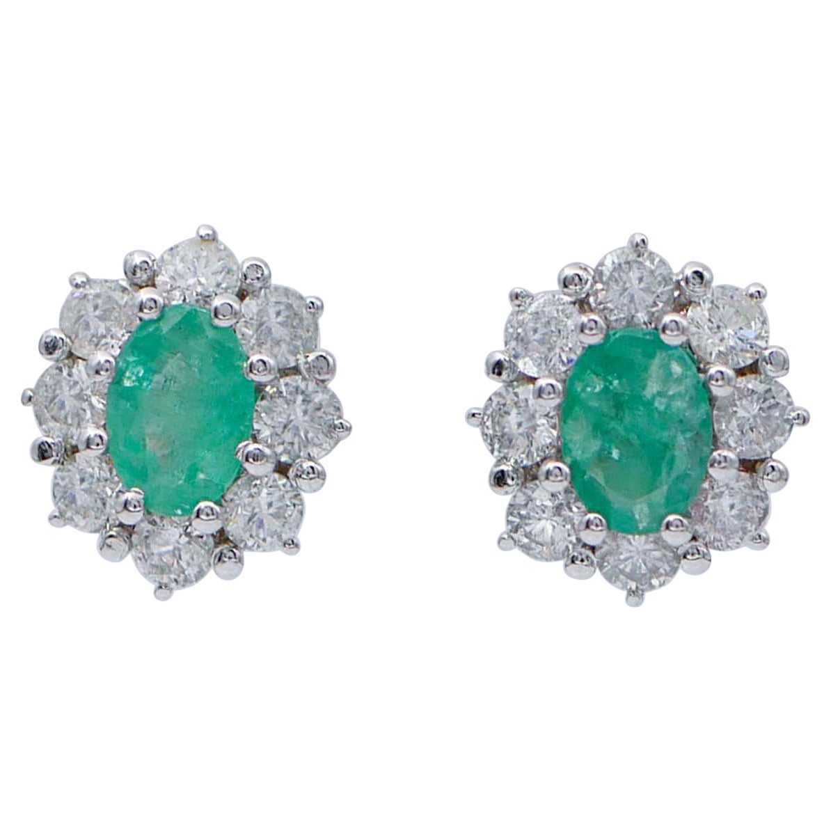 Emeralds, Diamonds, Platinum Stud Earrings.