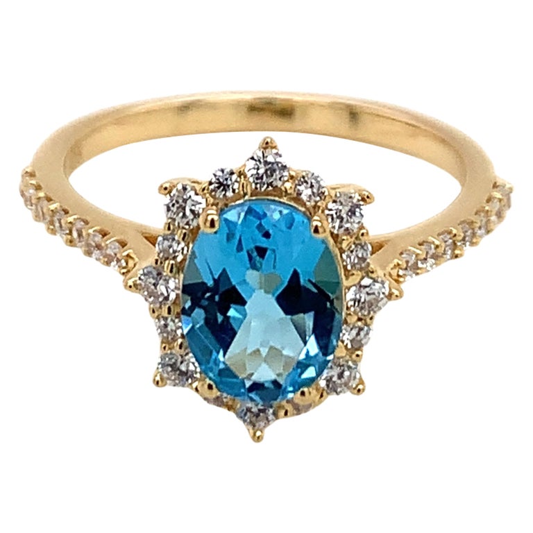 Oval Natural Swiss Blue Topaz And CZ Yellow Gold Over Sterling Silver ...