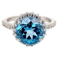 Round Natural Swiss Blue Topaz And CZ Rhodium over Sterling Silver Ring