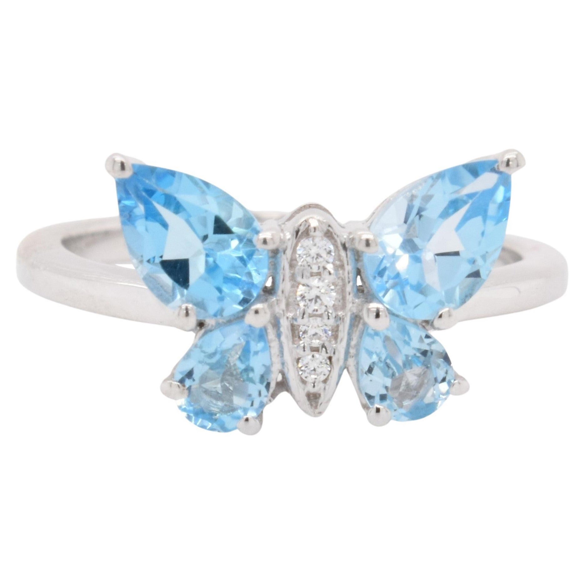 Pear Natural Swiss Blue Topaz And CZ Rhodium over Sterling Silver Ring