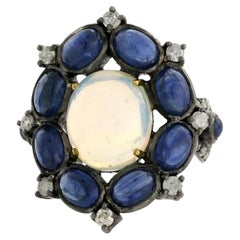 Center Stone Opal Ring Surrounded by Blue Sapphires & Diamonds Made in 18k Gold