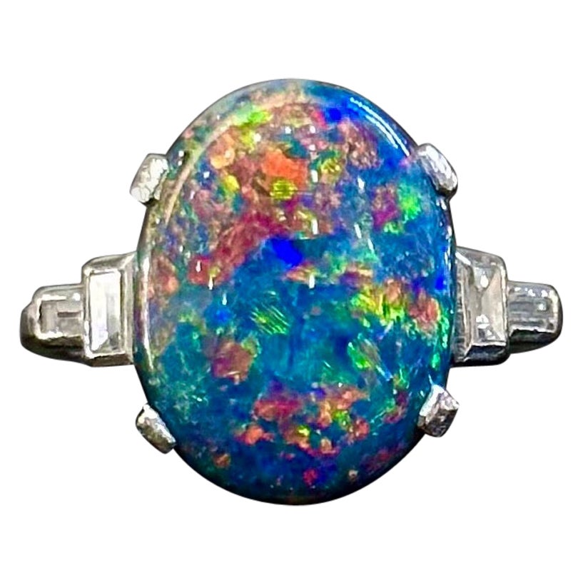 Art Deco Harlekin kostbarer schwarzer Opal Baguette Diamant Verlobungsring Platin