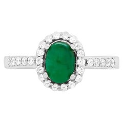 Oval Emerald 14 Karat White Gold Diamond Halo Fashion Ring