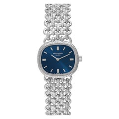 Patek Philippe Montre pour femme Ellipse en or blanc et cadran bleu avec cadran doré 4133