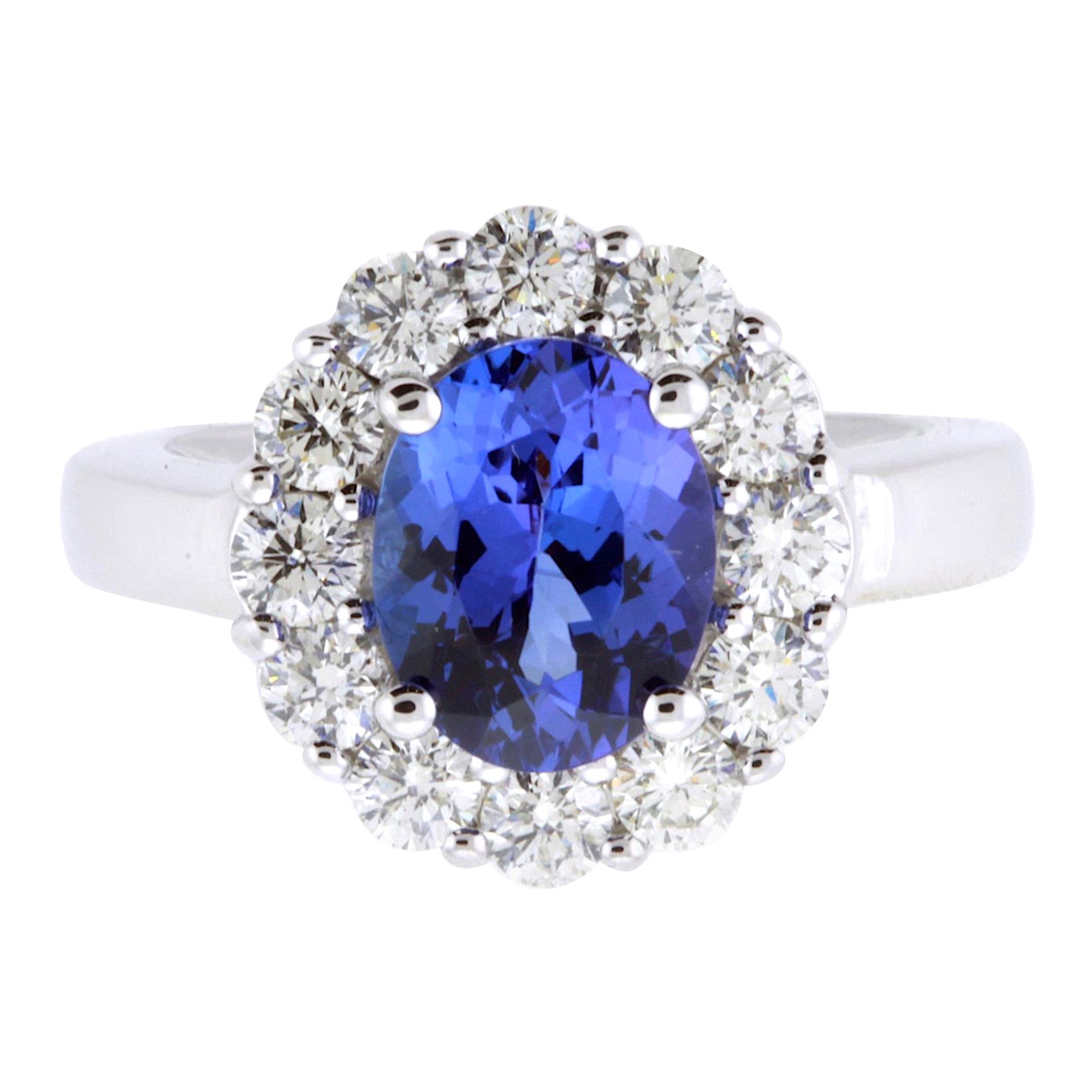 Oval Tanzanite Flower Halo Engagement Ring