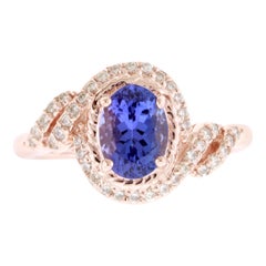 Oval Natural Tanzanite and Round White Diamond Halo Swirl Ring 14K Rose Gold