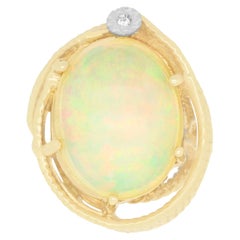 Oval Shaped Opal Yellow Swirls Single Round White Diamond 14K Yellow Gold Ring