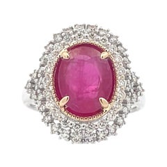 3.25 ct. Oval cut Ruby Double Diamond Halo Engagement Ring in 14K Gold