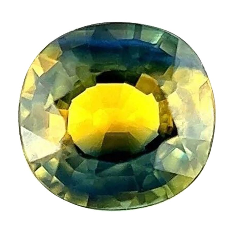 Unqiue Rare Bi Colour Sapphire 0.62ct Blue Yellow Orange Oval Cut For Sale