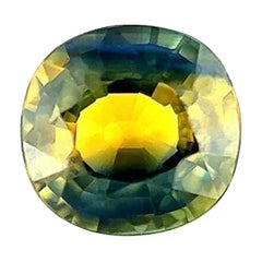 Unqiue Rare saphir bicolore de 0,62 carat, bleu, jaune et orange taille ovale