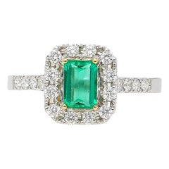 0.44 Carat Emerald Cut Natural Emerald Ring with Diamond Halo in 18K White Gold