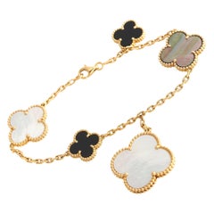Van Cleef & Arpels Magic Alhambra Yellow Gold Mother of Pearl and Onyx Bracelet