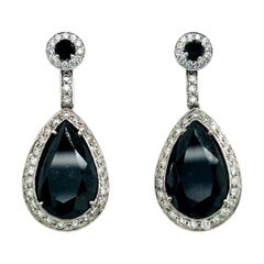Modern Gold 23 Carat Natural Colorless and Black Pear Shaped Diamond Earrings