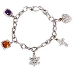 Multi-Gem Diamond Gold Charm Bracelet With Diamond Snow Flake and Cross 4