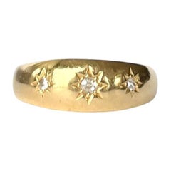 Antique Art Deco Diamond and 18 Carat Gold Three-Stone Star Setting Band