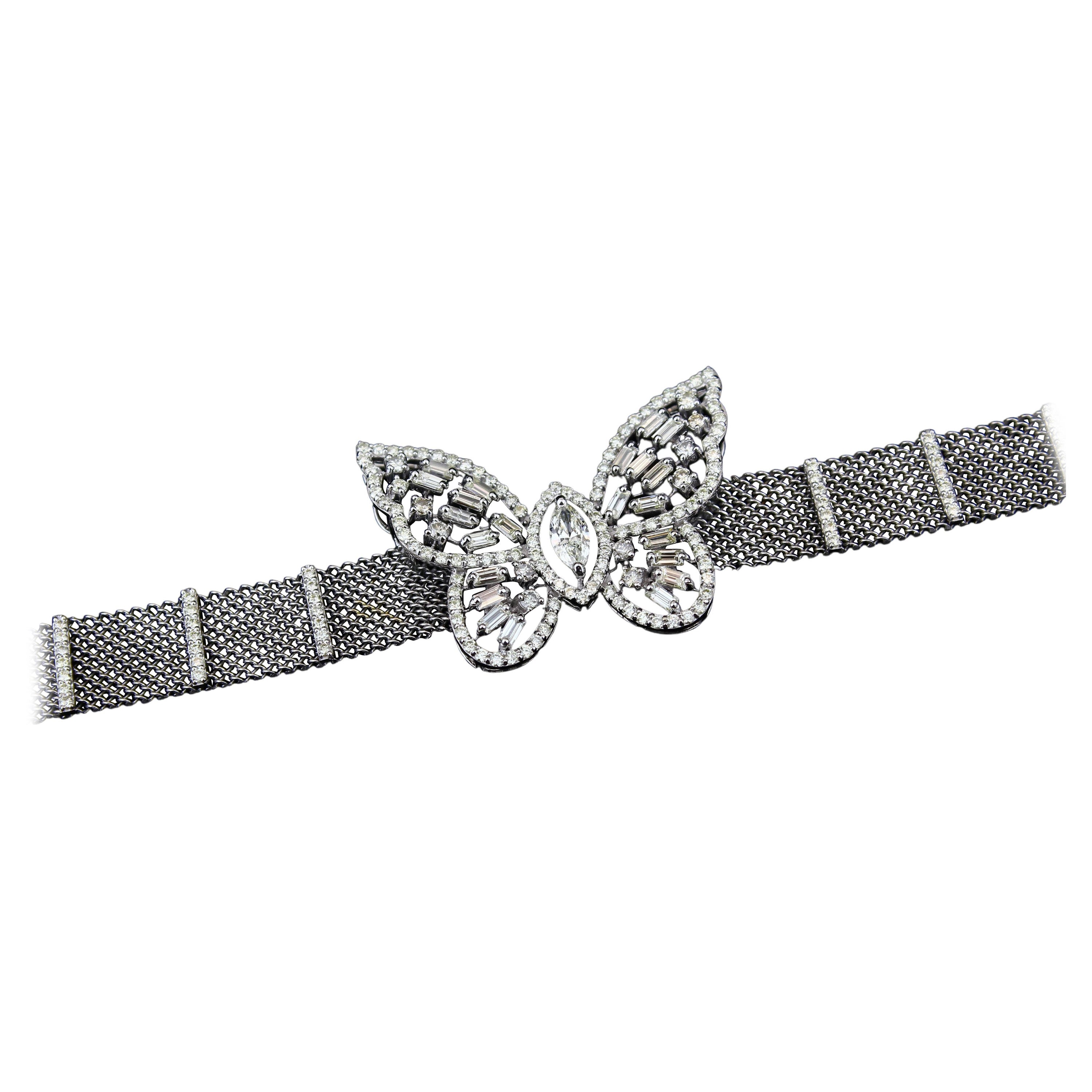 Bracelet en or massif 18 carats orné d'un papillon et de diamants marquises et baguettes