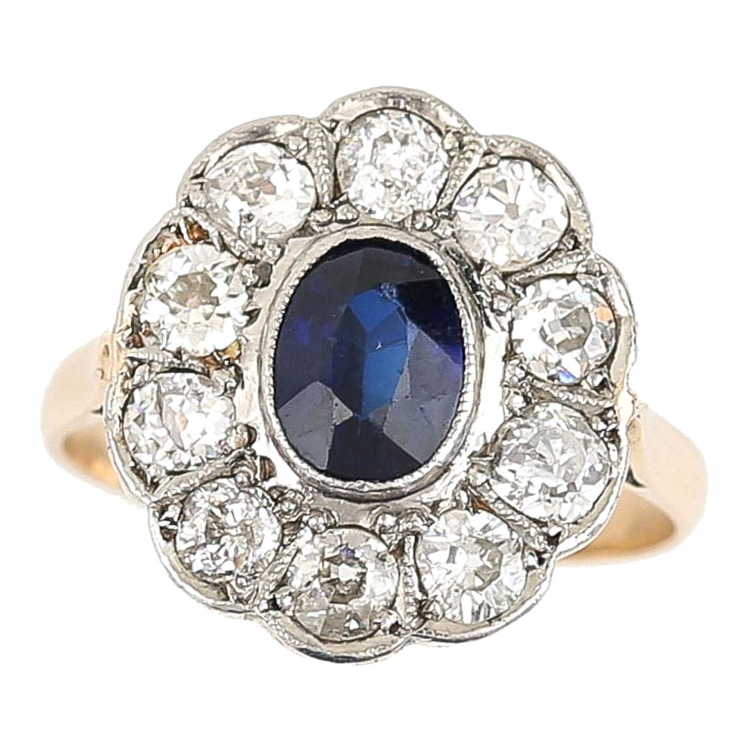 Edwardian 18ct Gold 1ct Sapphire and 1ct Diamond Cluster Ring, Circa 1910 For Sale