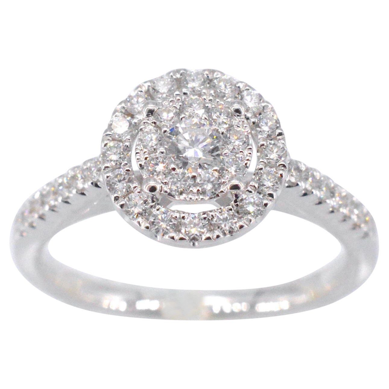 Bague d'entourage avec diamant taille brillant