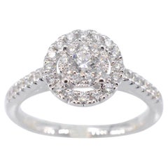 Bague d'entourage avec diamant taille brillant