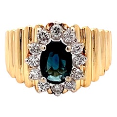 Ovaler blauer Saphir und Diamant-Ring aus 14 Karat Gelbgold
