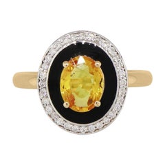 Oval Yellow Sapphire and Diamond Ring