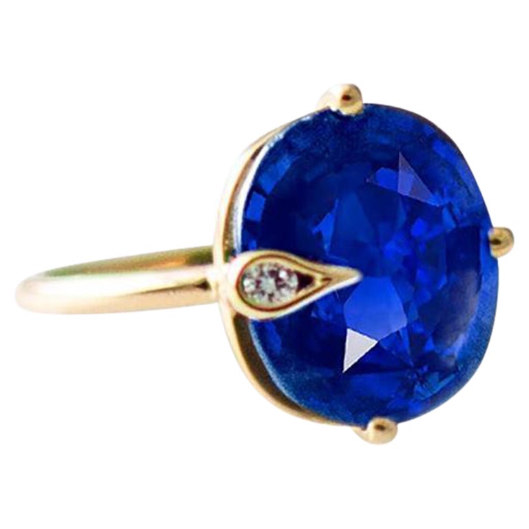 Four Carats Vivid Blue Sapphire Eighteen Karat Yellow Gold Ring with Diamond For Sale