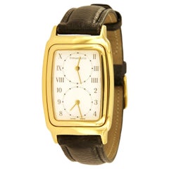 Tiffany & Co. 18 Karat Yellow Gold Dual Time Zone Watch M203
