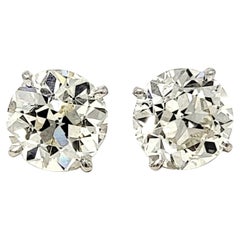 Antique 2.80 Carats Total Early Modern Brilliant Solitaire Diamond Stud Earrings in Gold