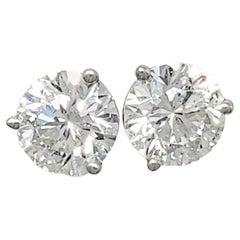 Used .94 Carats Total Round Leo Diamond Stud Earrings in White Gold 3 Prong Setting
