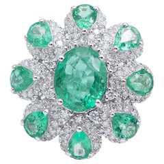 Vintage Emeralds, Diamonds, 18 Karat White Gold Flower Ring